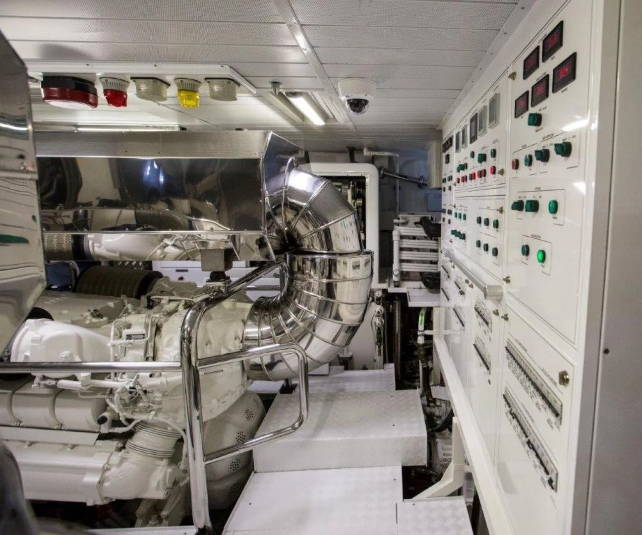 a room with several white machines aboard AMANECER Yacht for Sale
