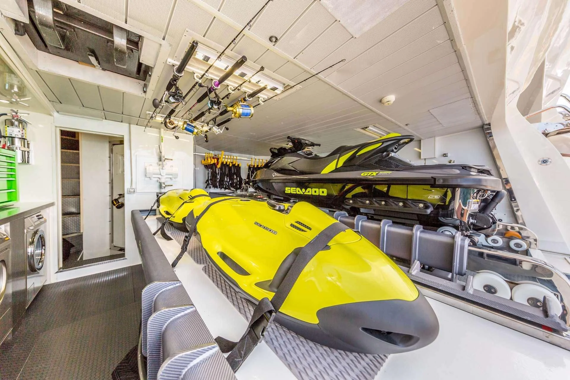 a car in a garage aboard AMANECER Yacht for Sale