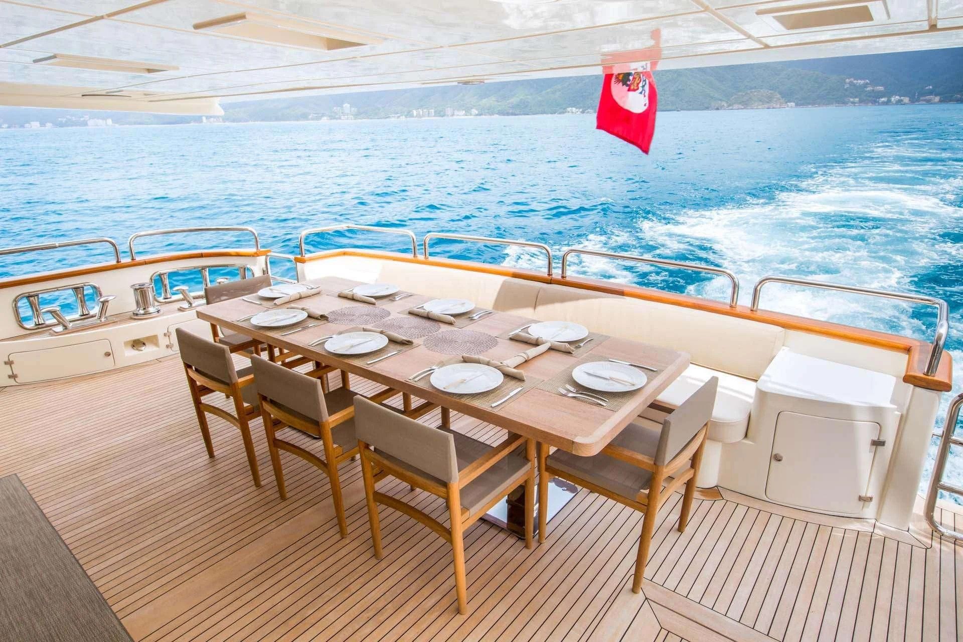 a table on a boat aboard AMANECER Yacht for Sale