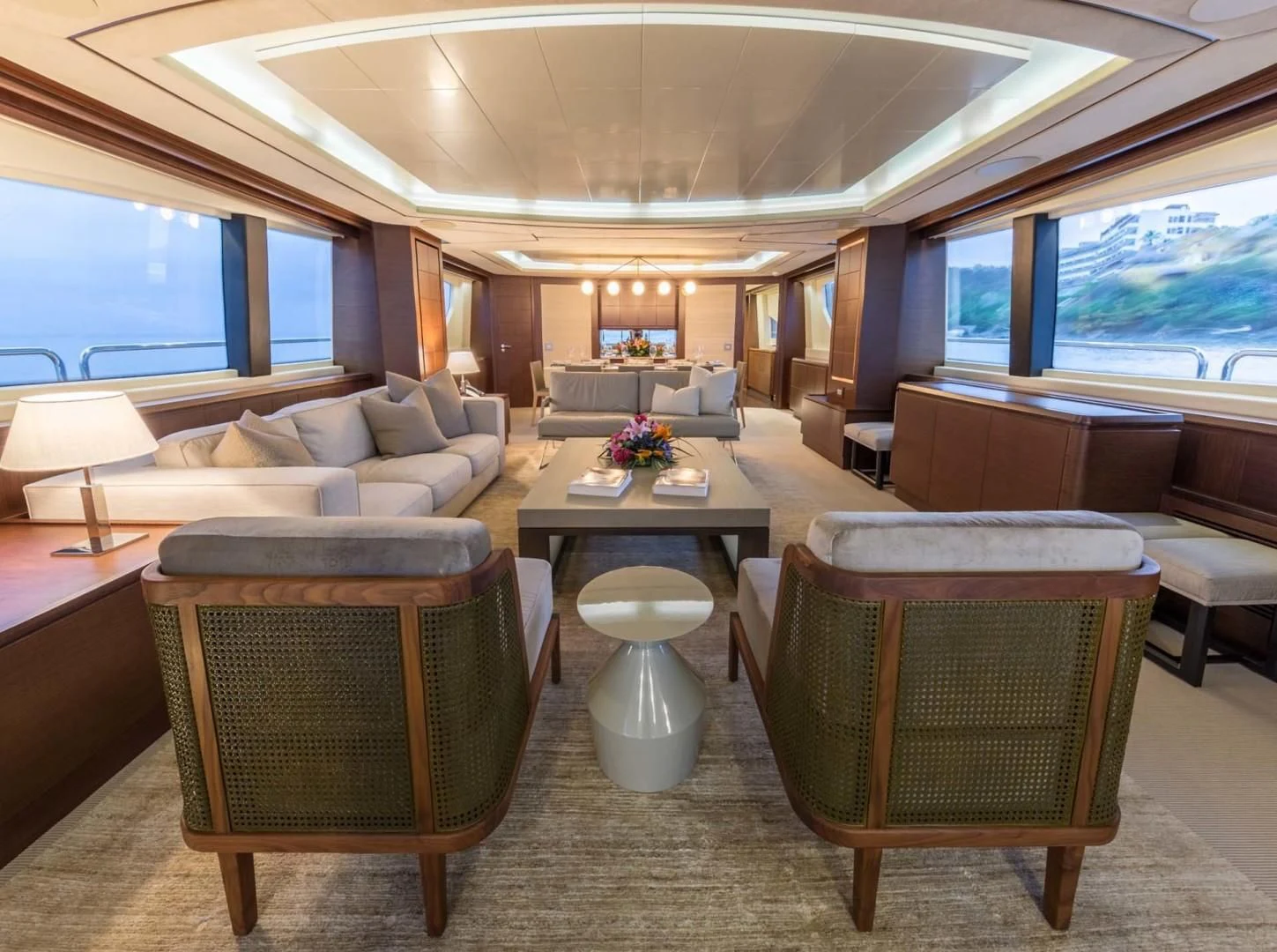 a living room with a large window aboard AMANECER Yacht for Sale