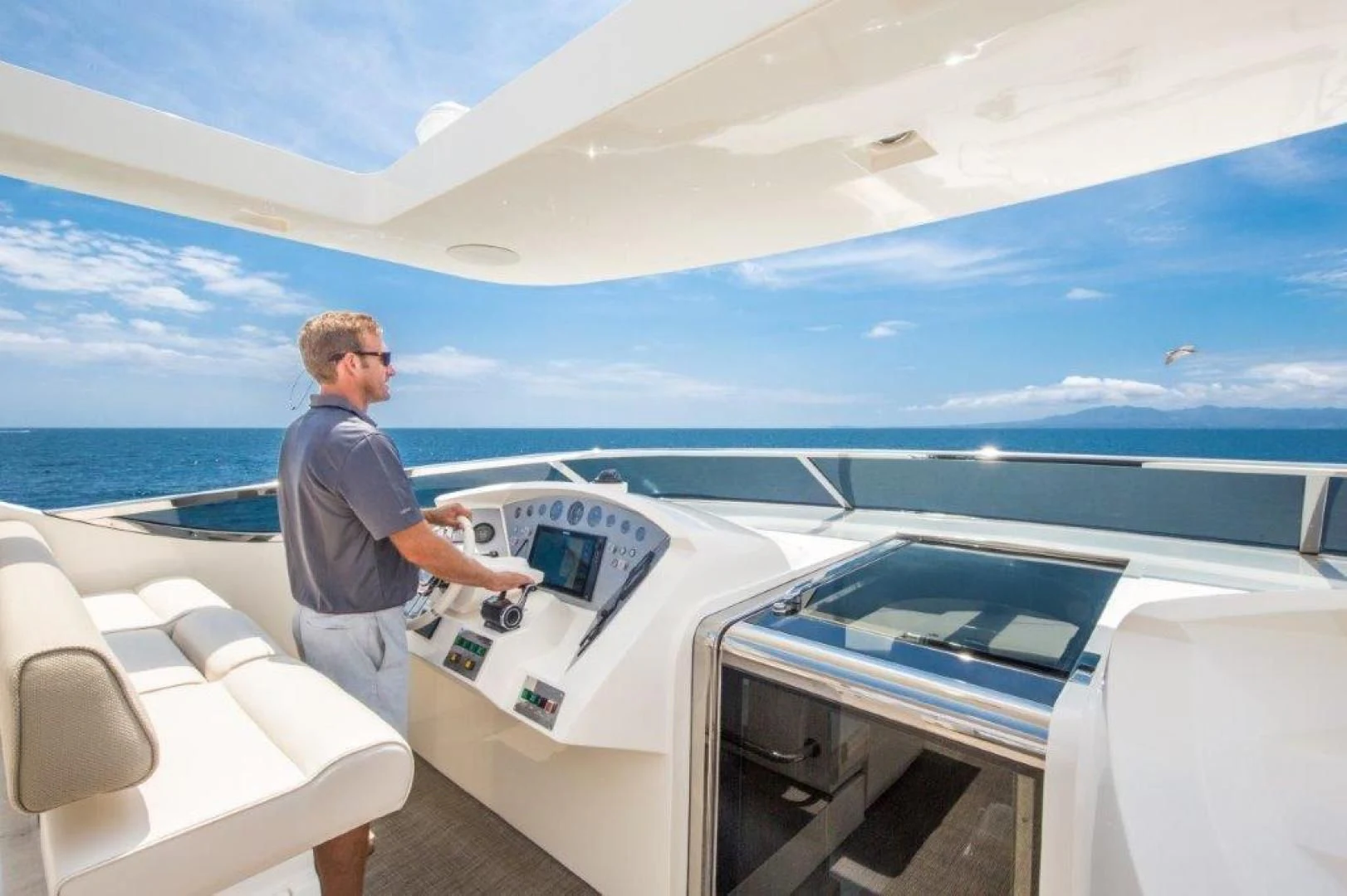 a man on a boat aboard AMANECER Yacht for Sale