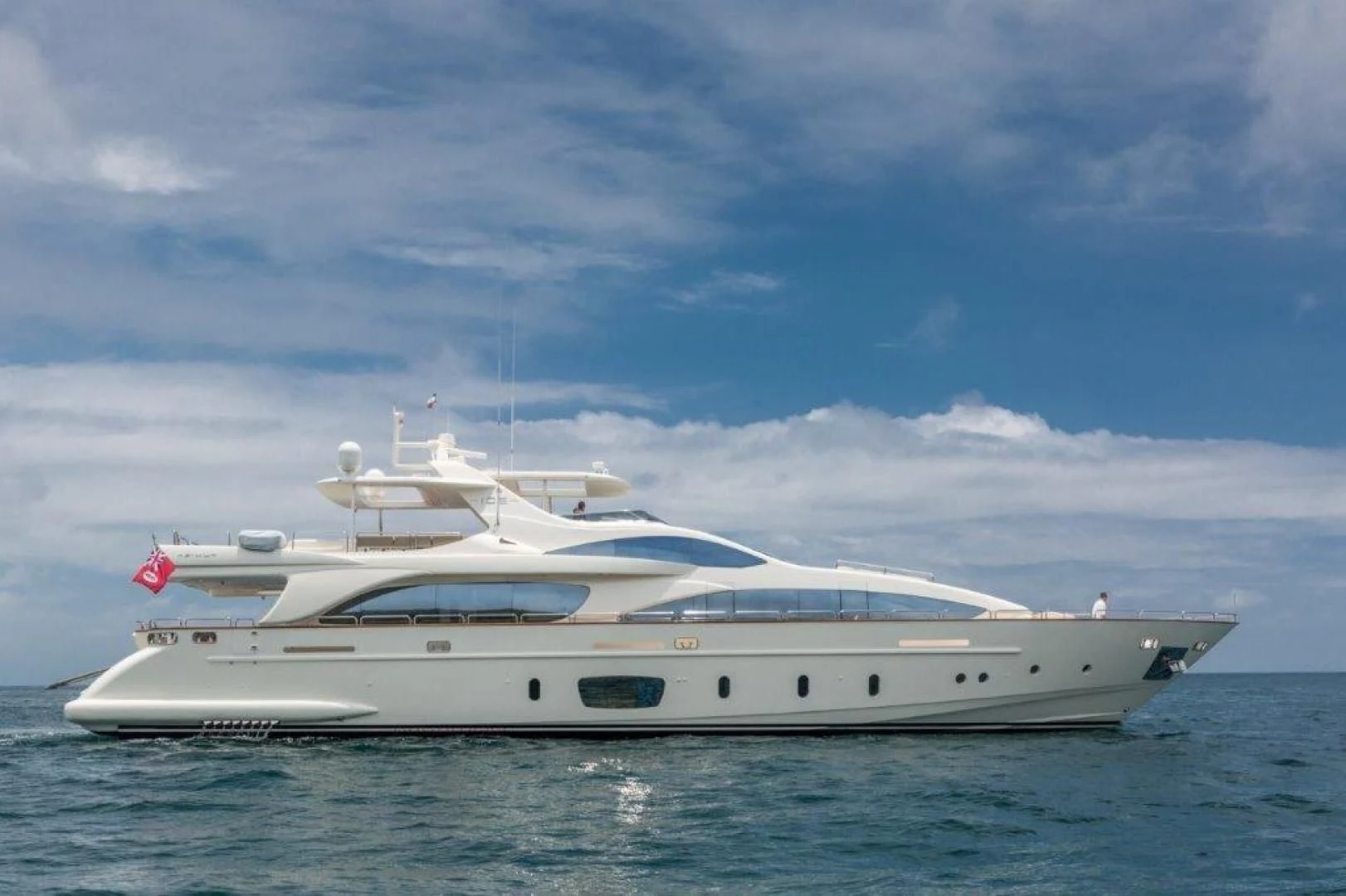 a white yacht in the water aboard AMANECER Yacht for Sale