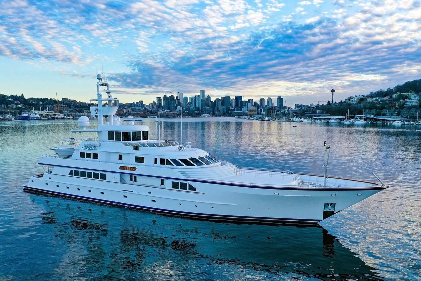 a white yacht on water aboard ICE BEAR Yacht for Sale