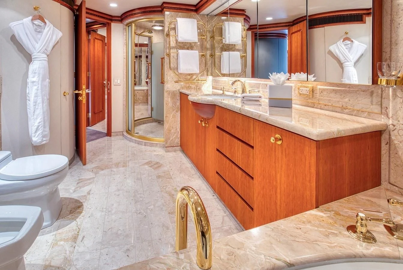 a bathroom with marble counter tops aboard ICE BEAR Yacht for Sale