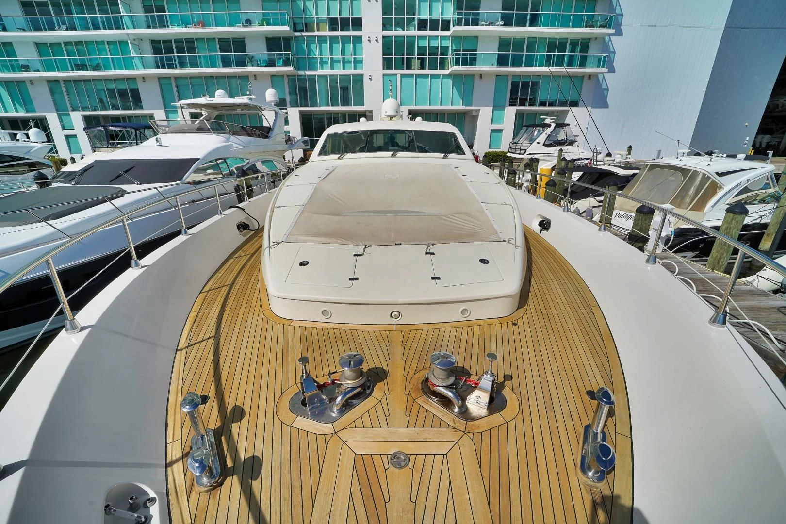a large white umbrella sits on a table aboard CHURRI Yacht for Sale