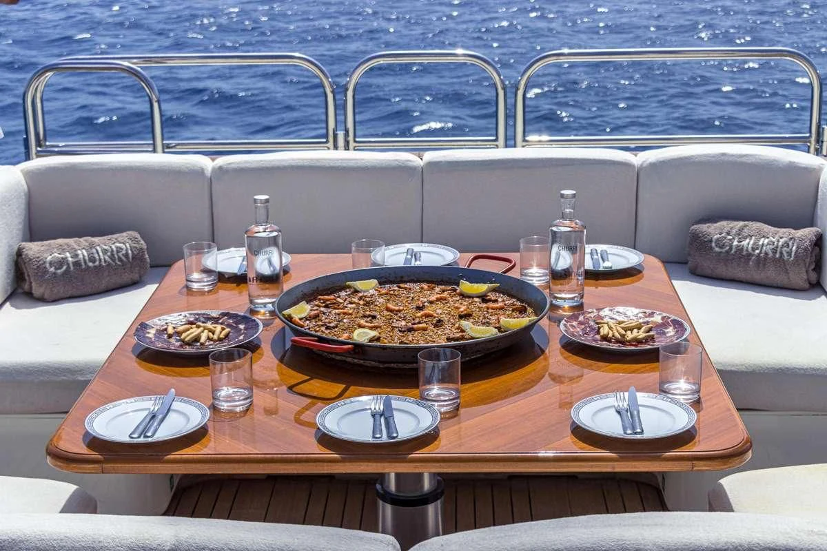 a table with food on it aboard CHURRI Yacht for Sale