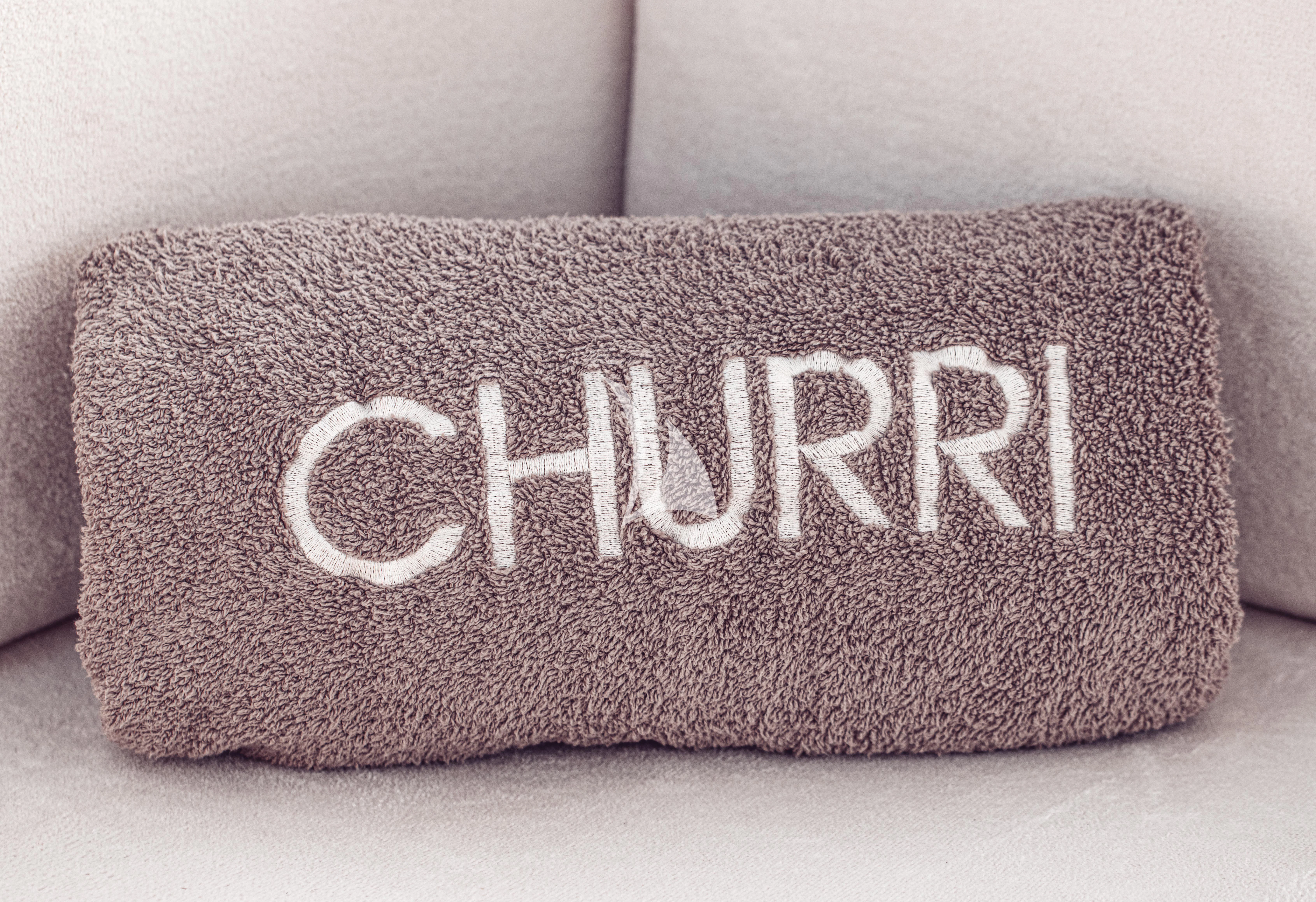 a grey square with a white text on it aboard CHURRI Yacht for Sale