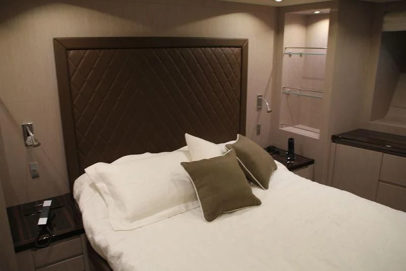 a bed with white sheets aboard TSA TSA Yacht for Sale