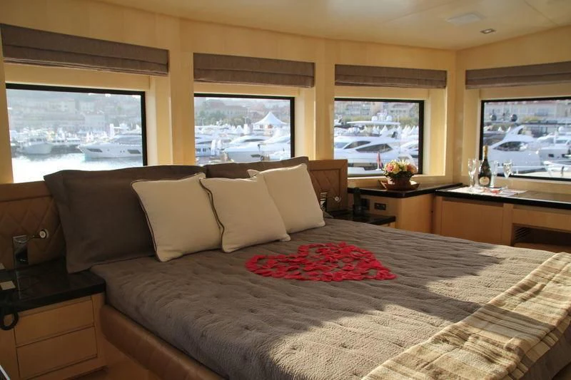 a bed with pillows aboard TSA TSA Yacht for Sale
