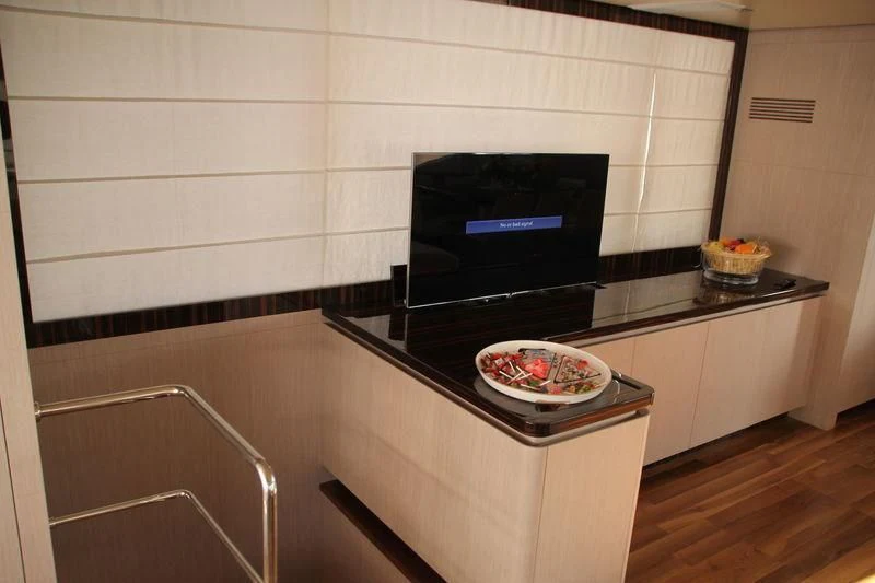a kitchen with a stove and oven aboard TSA TSA Yacht for Sale