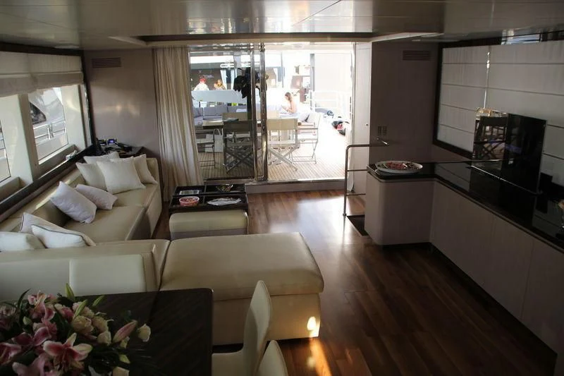 a living room with a large window aboard TSA TSA Yacht for Sale