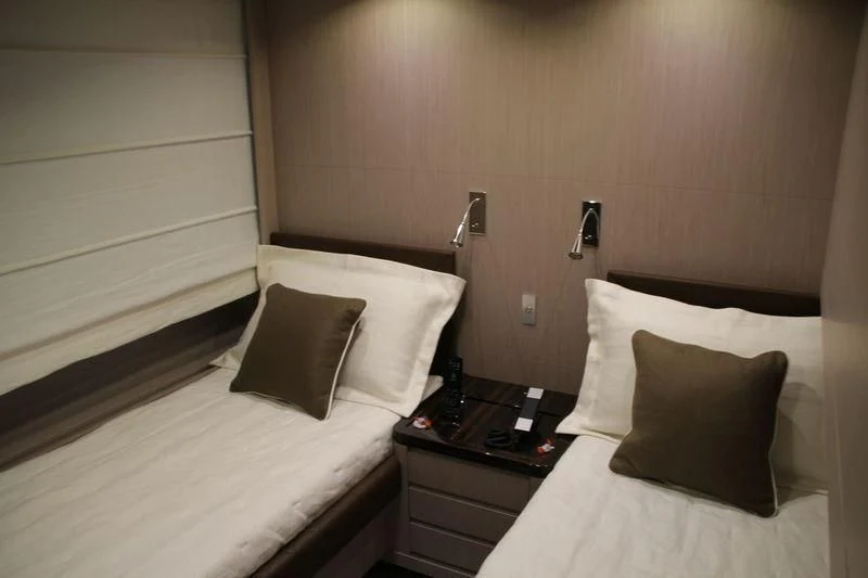 a hotel room with two beds aboard TSA TSA Yacht for Sale