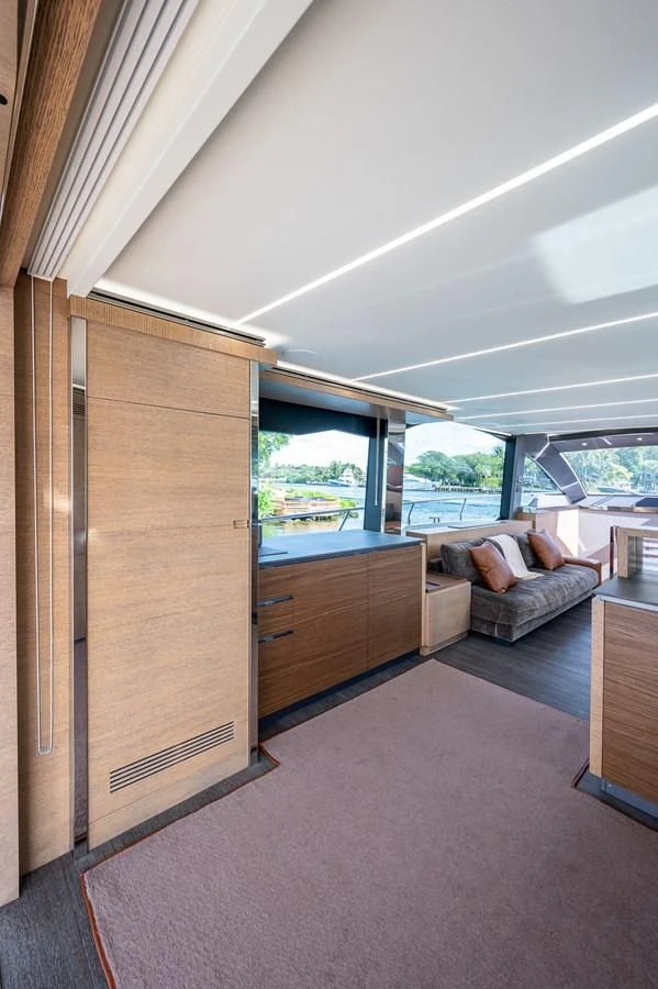 a room with a bed and a couch aboard LEBRADA Yacht for Sale