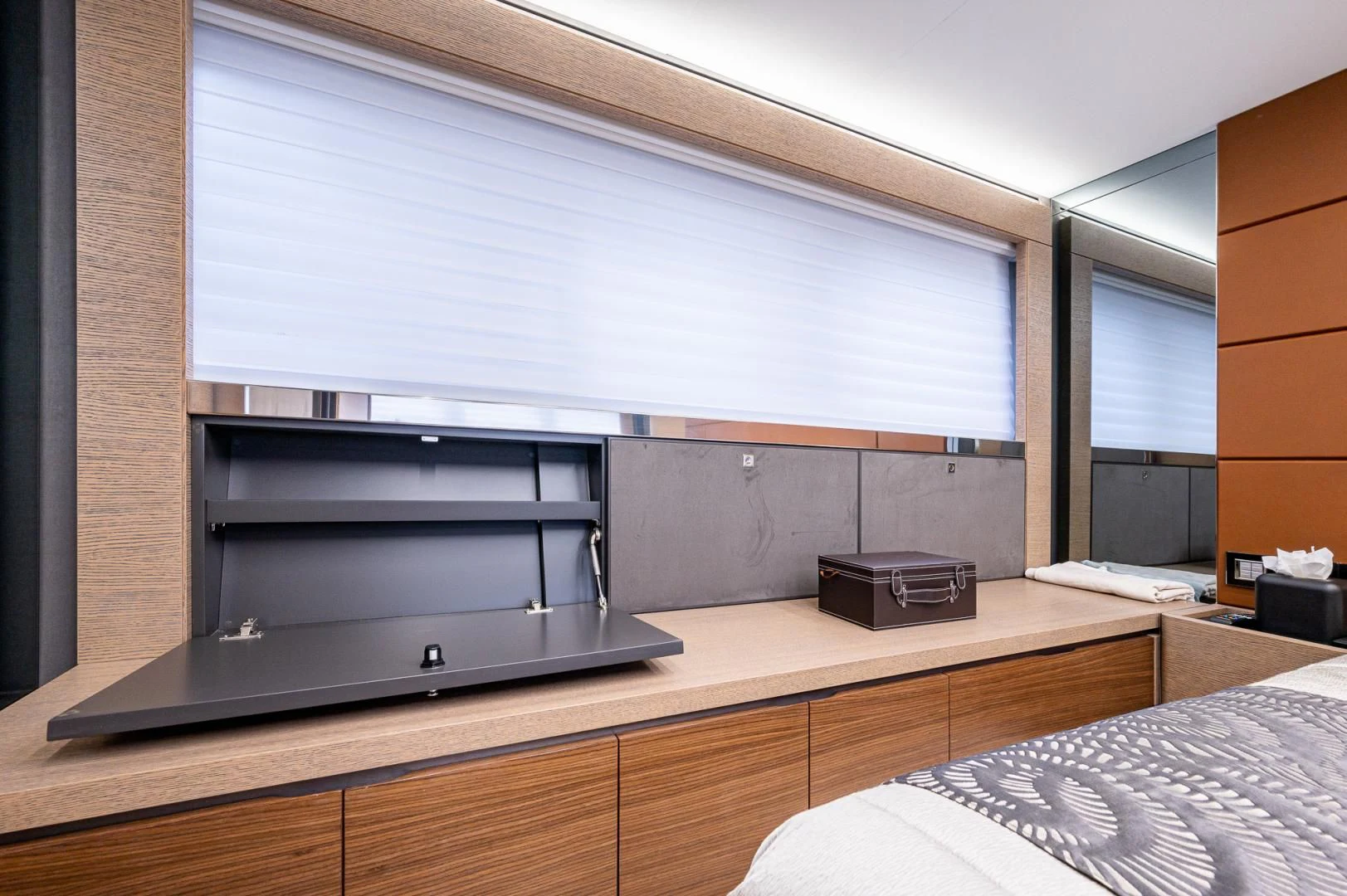 a tv on a shelf aboard LEBRADA Yacht for Sale