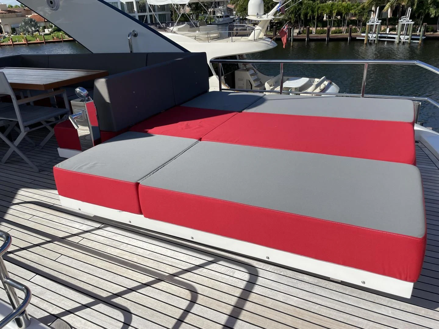 a red and white striped boat aboard LEBRADA Yacht for Sale