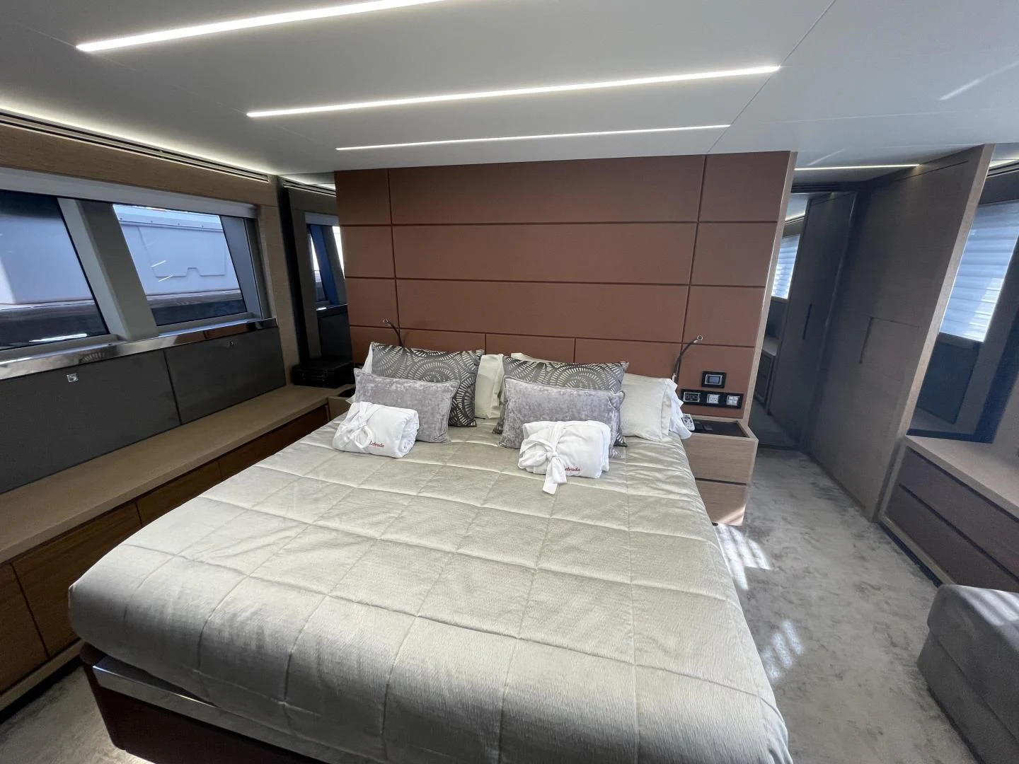 a bed in a room aboard LEBRADA Yacht for Sale