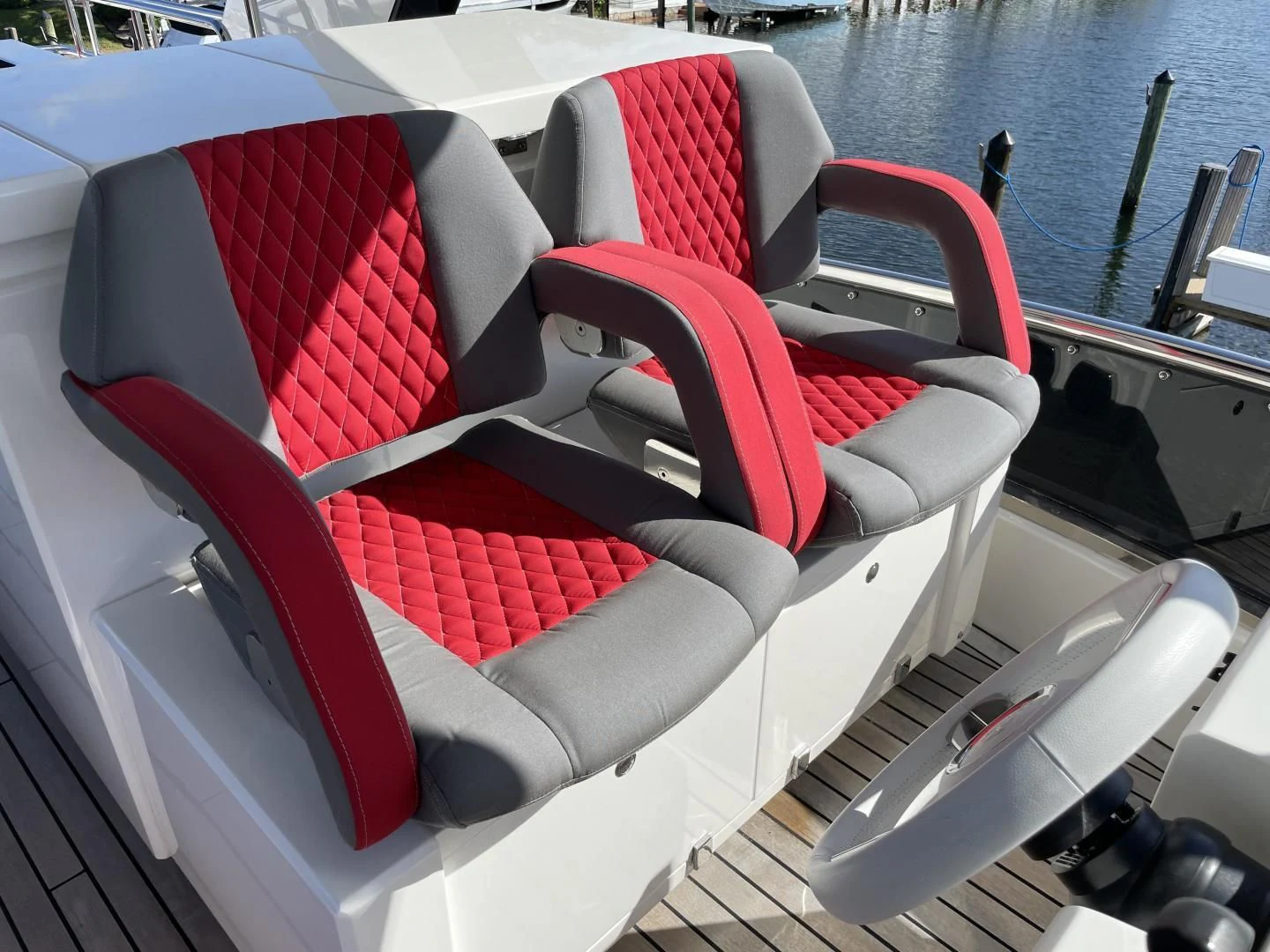 a deck with chairs on it aboard LEBRADA Yacht for Sale