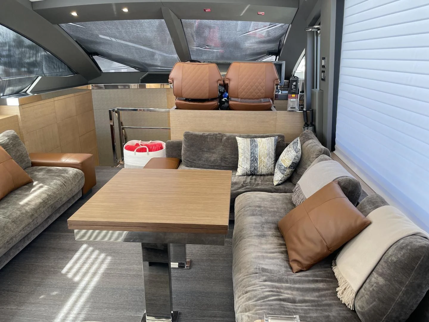 a living room with couches and a coffee table aboard LEBRADA Yacht for Sale