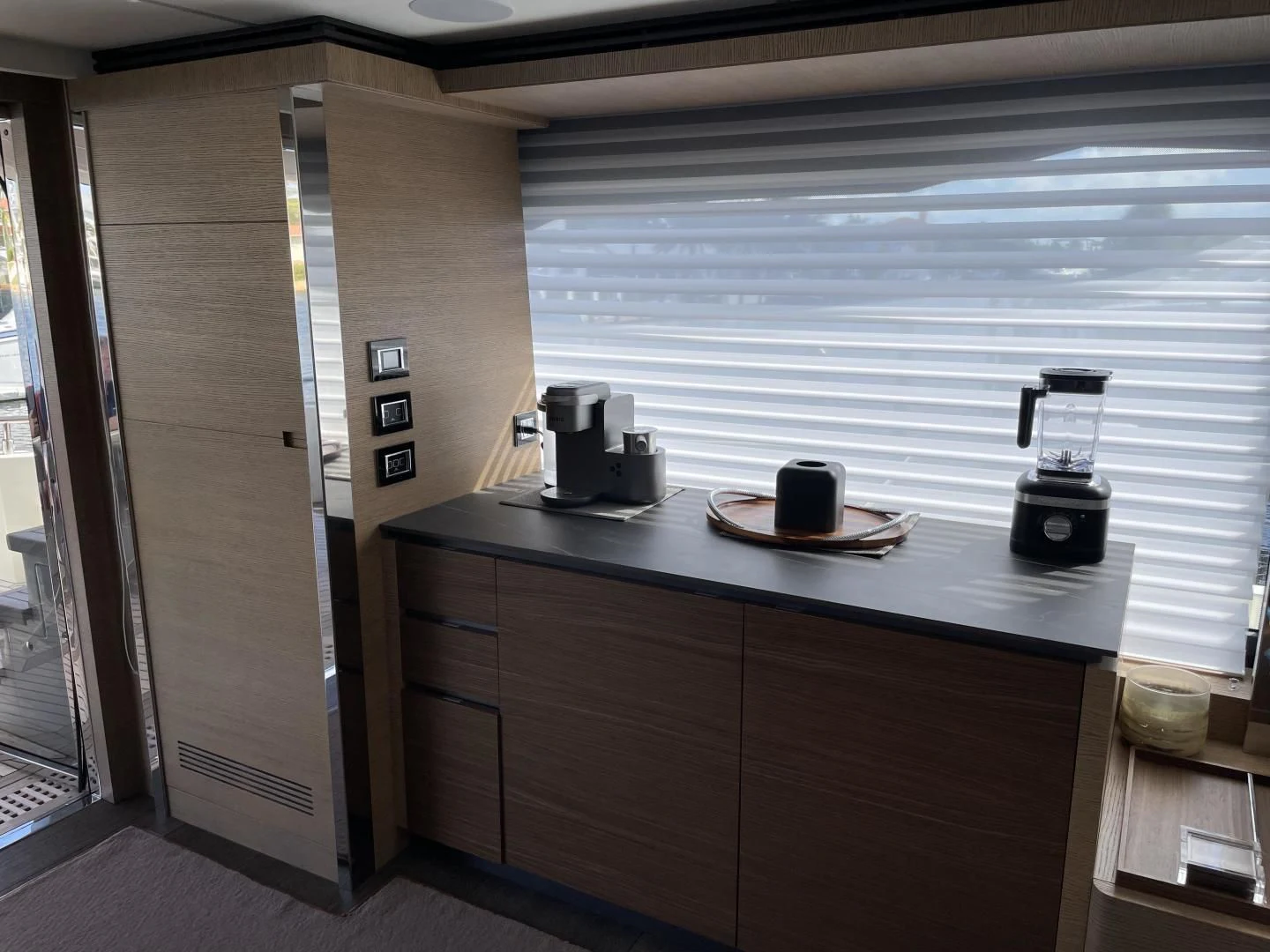 a counter top with a coffee maker on it aboard LEBRADA Yacht for Sale
