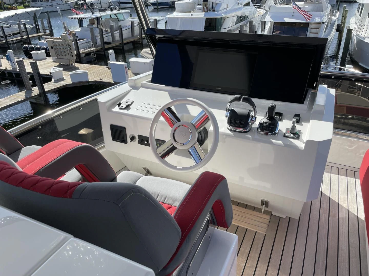 a room with a large white table and a black screen aboard LEBRADA Yacht for Sale