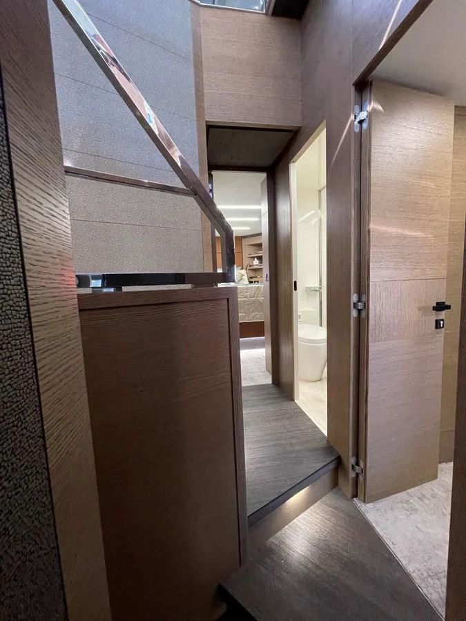 a hallway with doors aboard LEBRADA Yacht for Sale