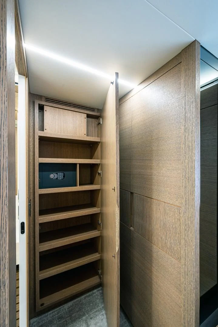 a wooden cabinet with a sign on it aboard LEBRADA Yacht for Sale