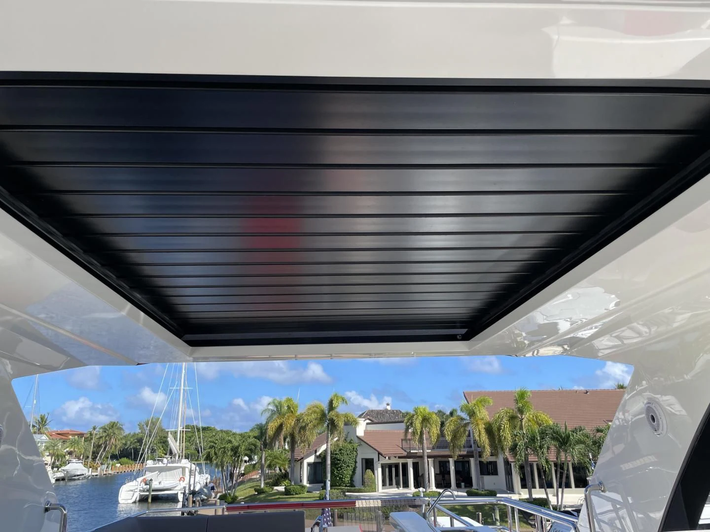 a view of a beach from a window of a boat aboard LEBRADA Yacht for Sale