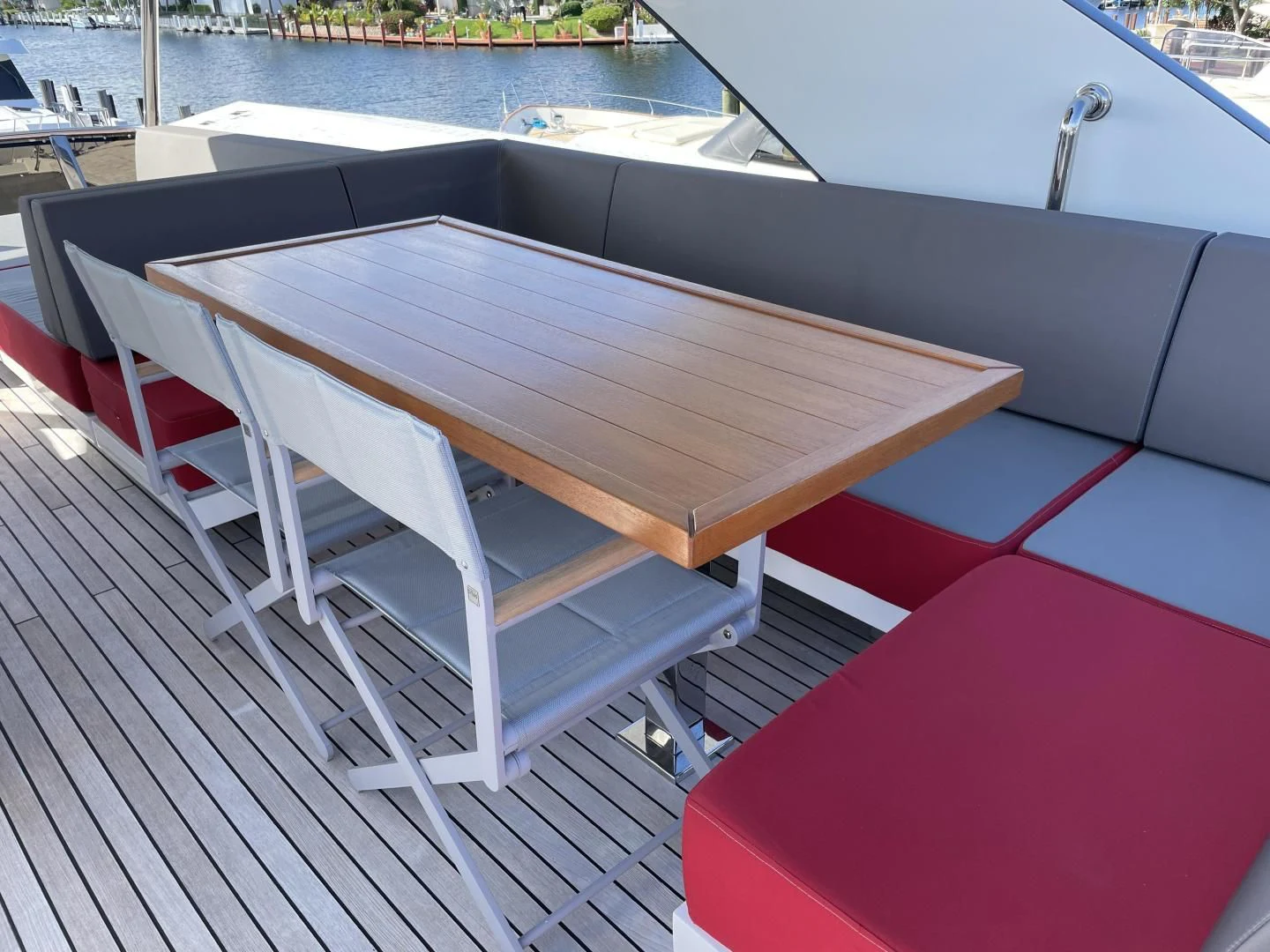 a wooden table on a boat aboard LEBRADA Yacht for Sale