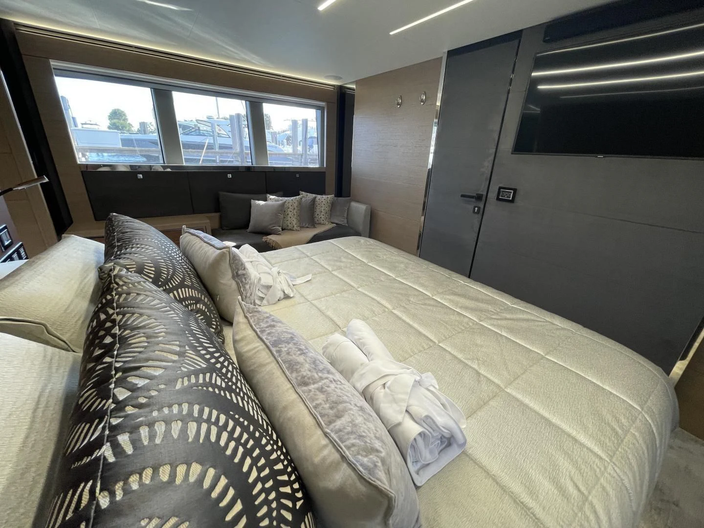a couch and a television in a room aboard LEBRADA Yacht for Sale
