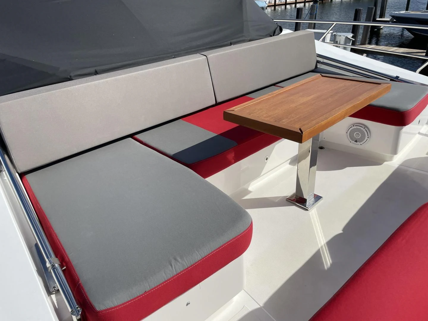 a table and a chair aboard LEBRADA Yacht for Sale