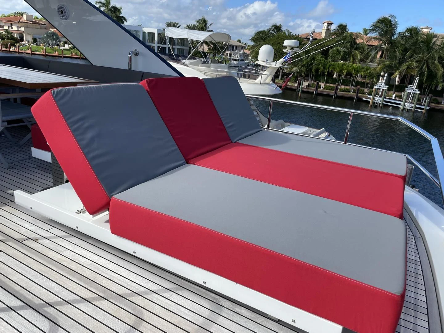 a red and white boat on a dock aboard LEBRADA Yacht for Sale