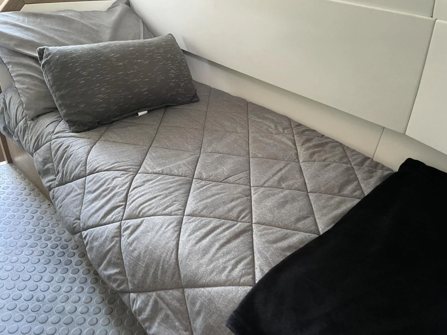 a bed with pillows aboard LEBRADA Yacht for Sale