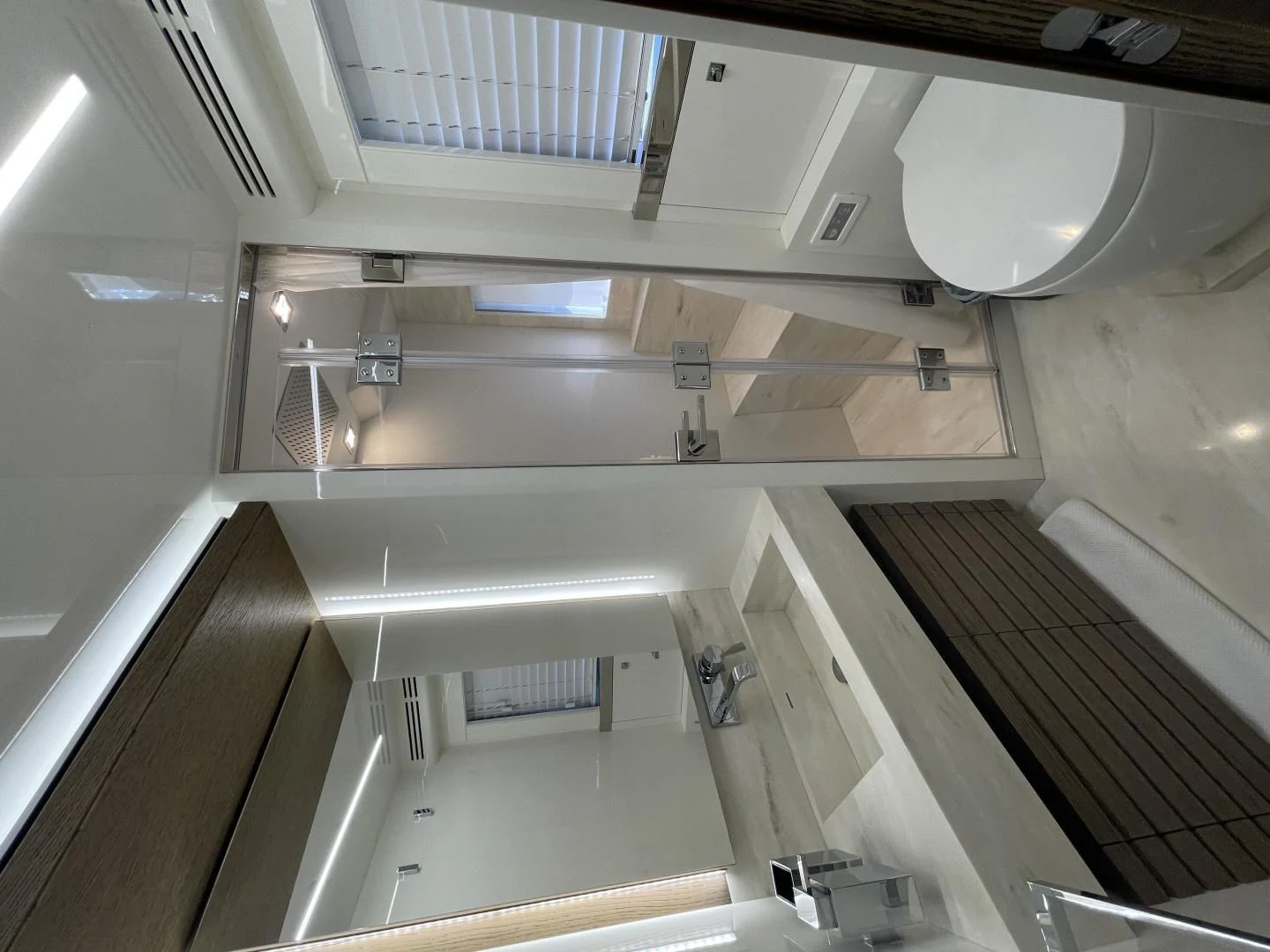 a large white and grey bathroom aboard LEBRADA Yacht for Sale