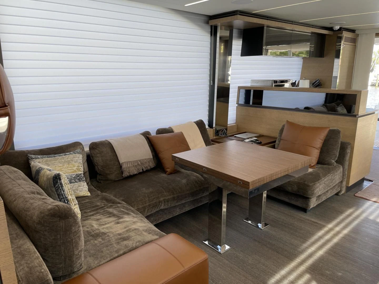 a living room with a couch and a table aboard LEBRADA Yacht for Sale