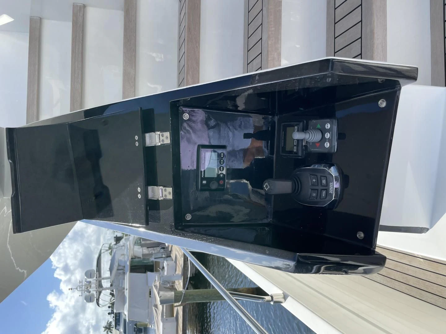 a black rectangular object with a screen aboard LEBRADA Yacht for Sale