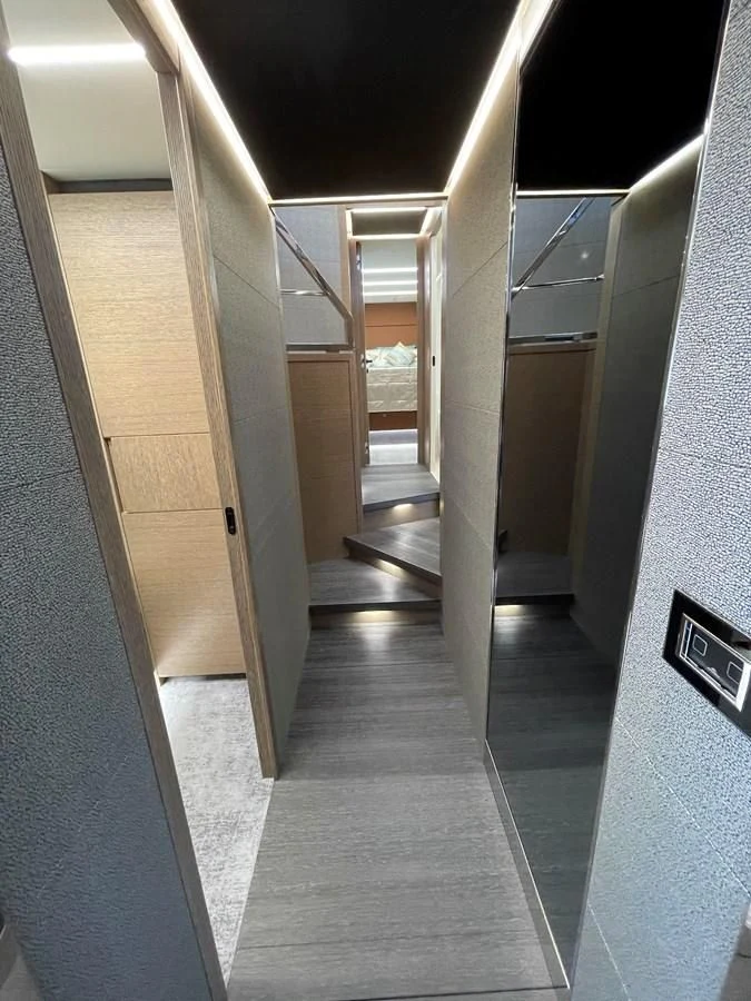 a hallway with doors aboard LEBRADA Yacht for Sale