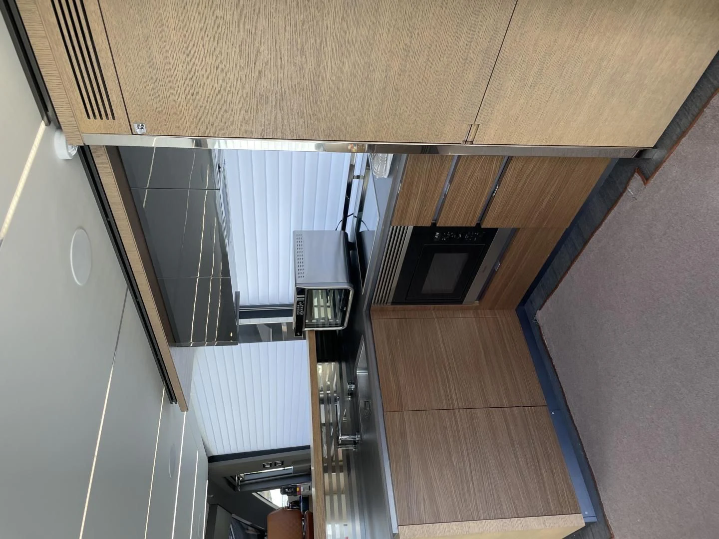 a wooden deck with a vent and a vent on the side aboard LEBRADA Yacht for Sale