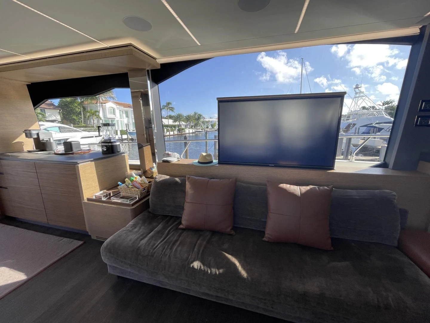 a bed with a flat screen television aboard LEBRADA Yacht for Sale