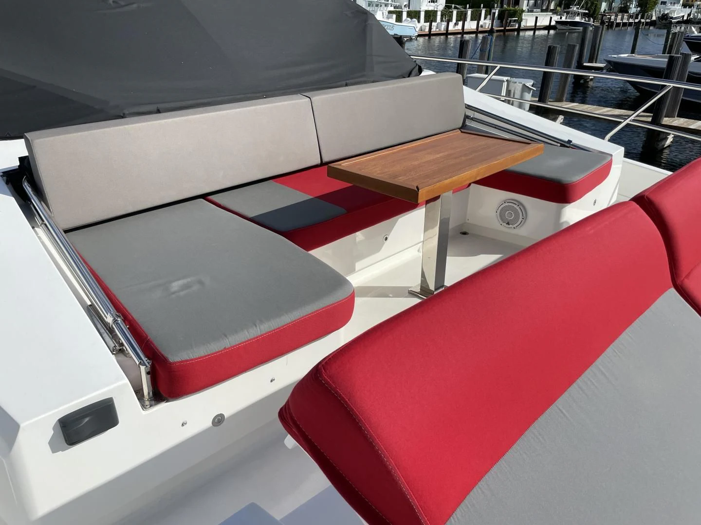 a red and white car aboard LEBRADA Yacht for Sale