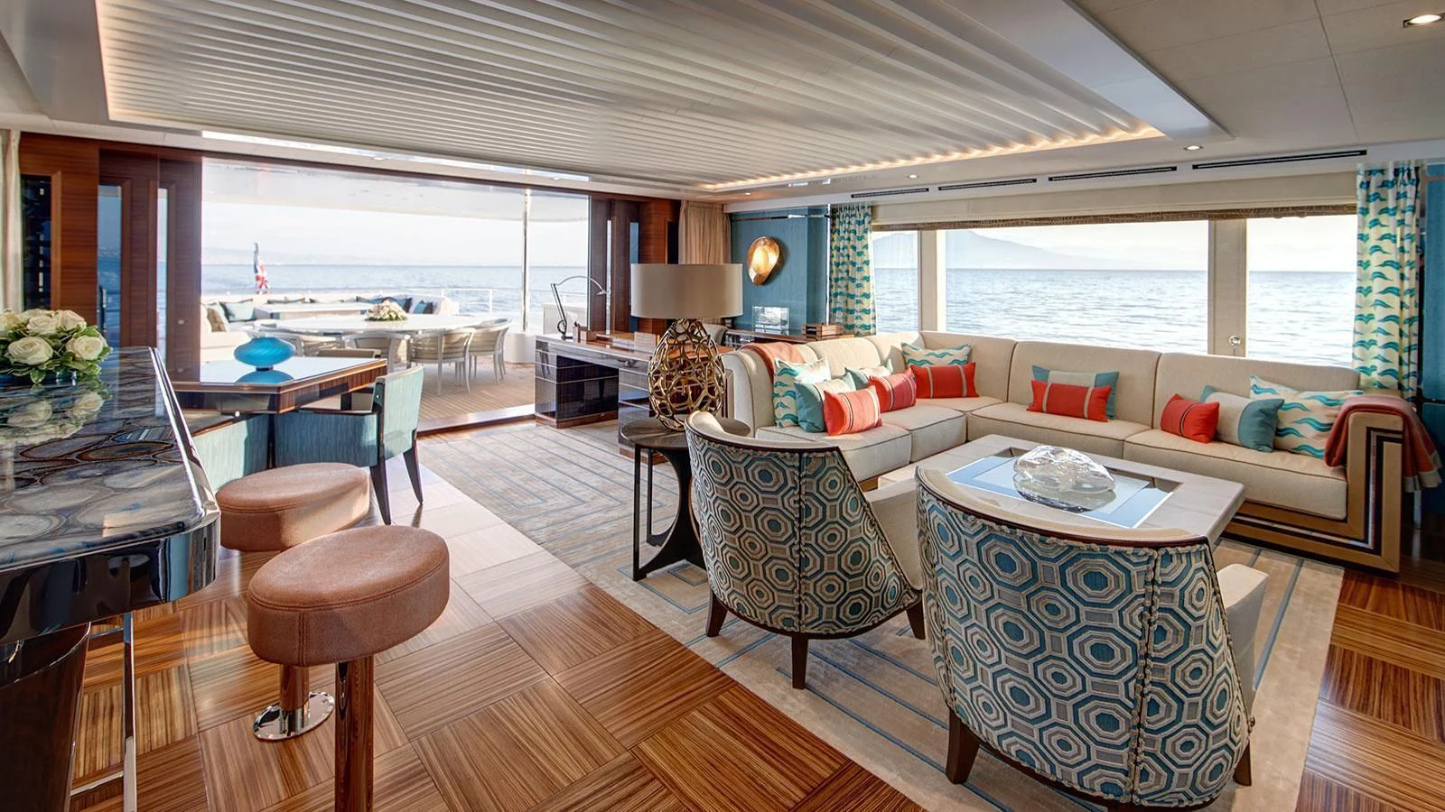a living room with a couch and a table aboard PHILOSOPHY Yacht for Sale