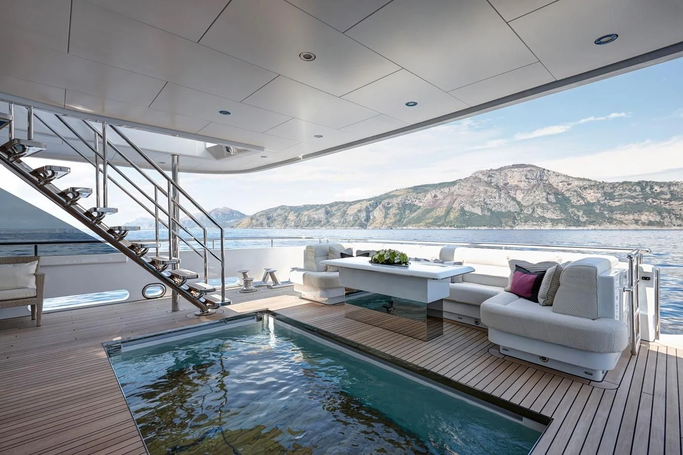 a large balcony overlooking a large body of water aboard PHILOSOPHY Yacht for Sale