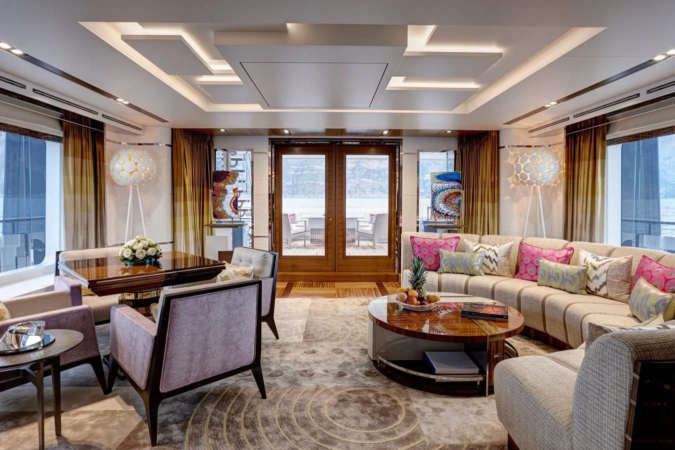 a living room with a couch and a table aboard PHILOSOPHY Yacht for Sale