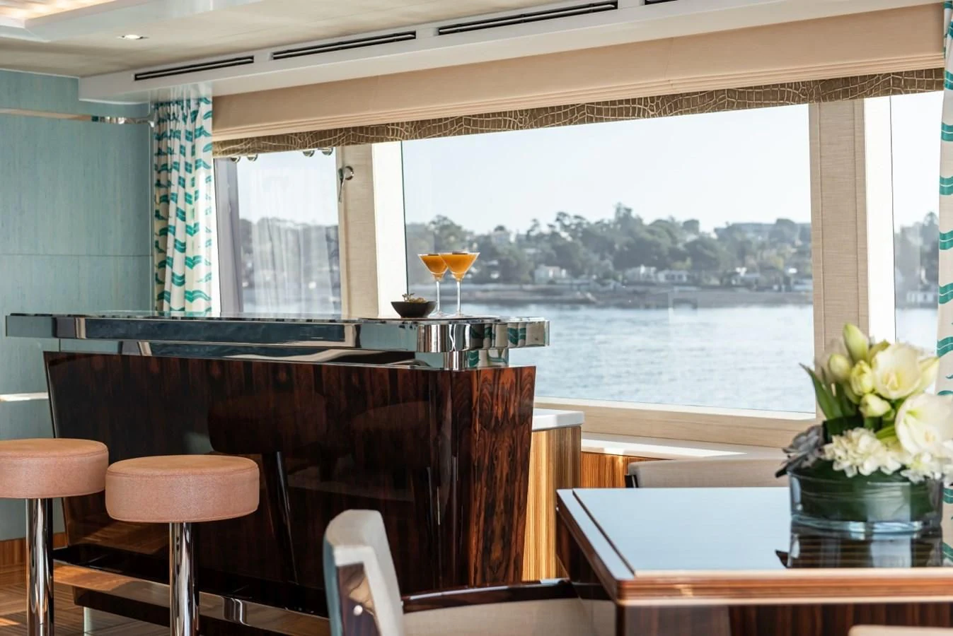 a table with glasses on it aboard PHILOSOPHY Yacht for Sale