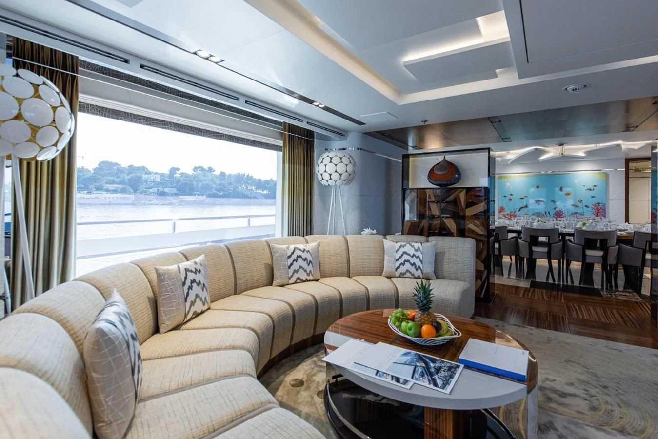 a living room with a large window aboard PHILOSOPHY Yacht for Sale