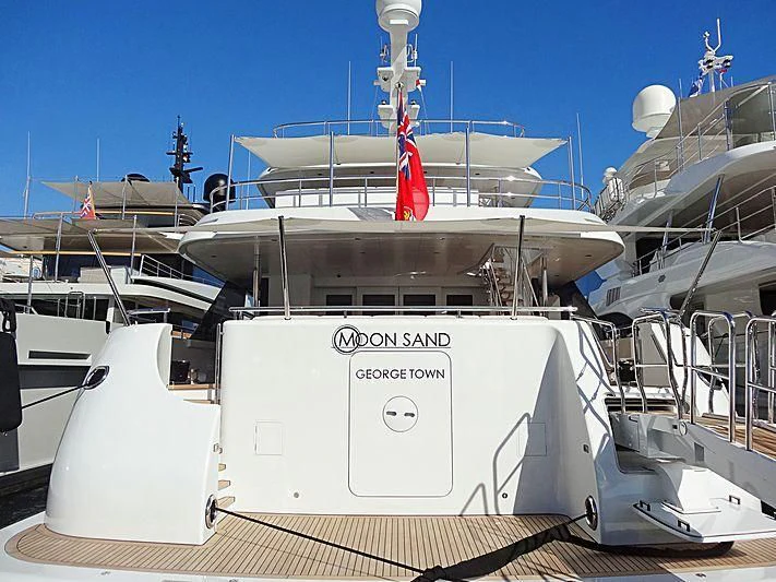 a large white boat with a red stripe on the front aboard PHILOSOPHY Yacht for Sale