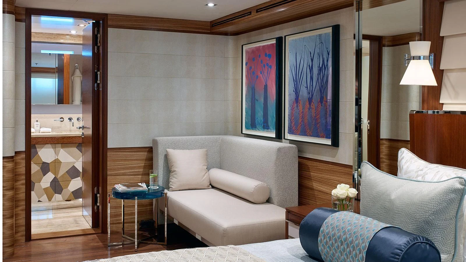 a living room with a large mirror aboard PHILOSOPHY Yacht for Sale