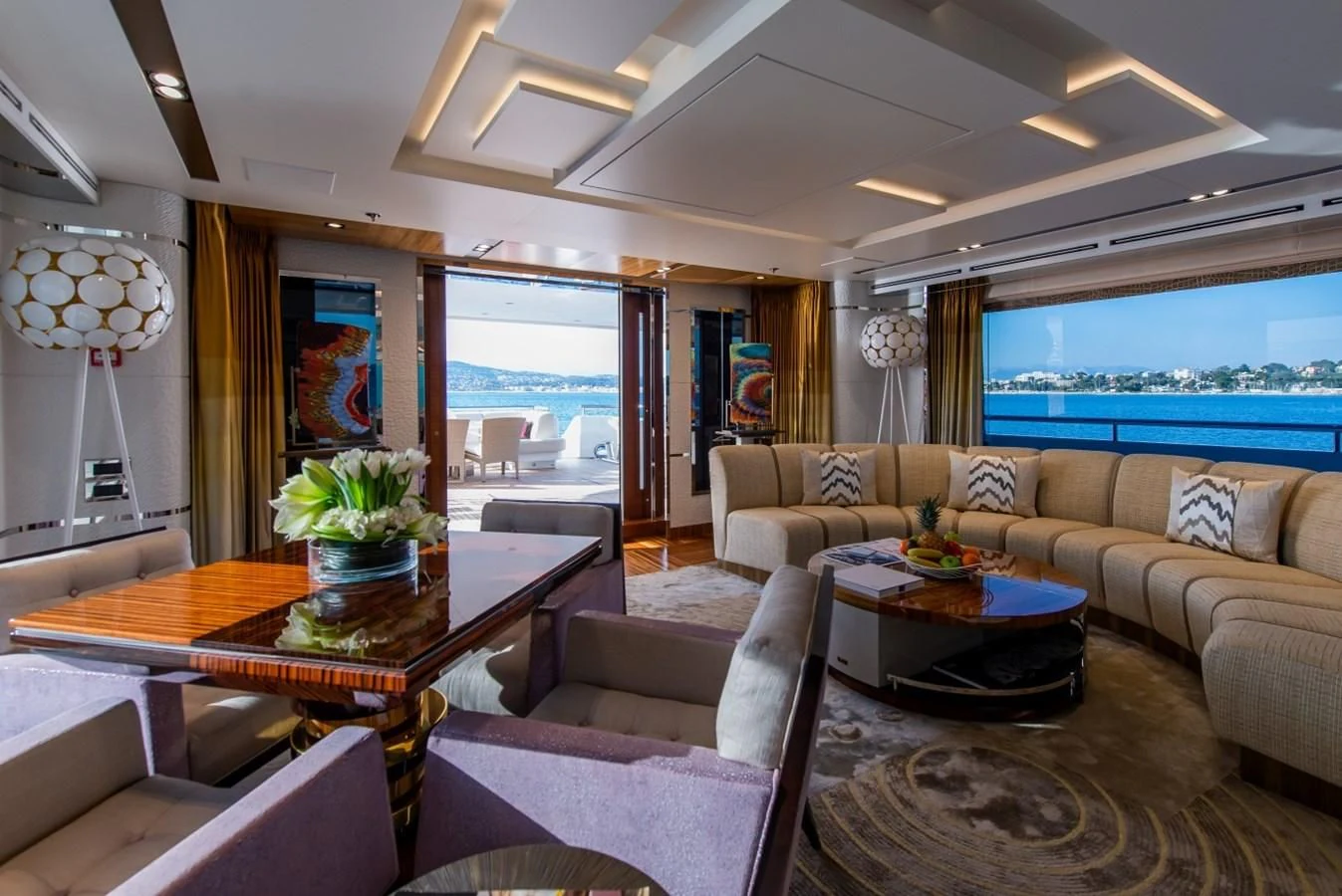 a living room with a large window aboard PHILOSOPHY Yacht for Sale