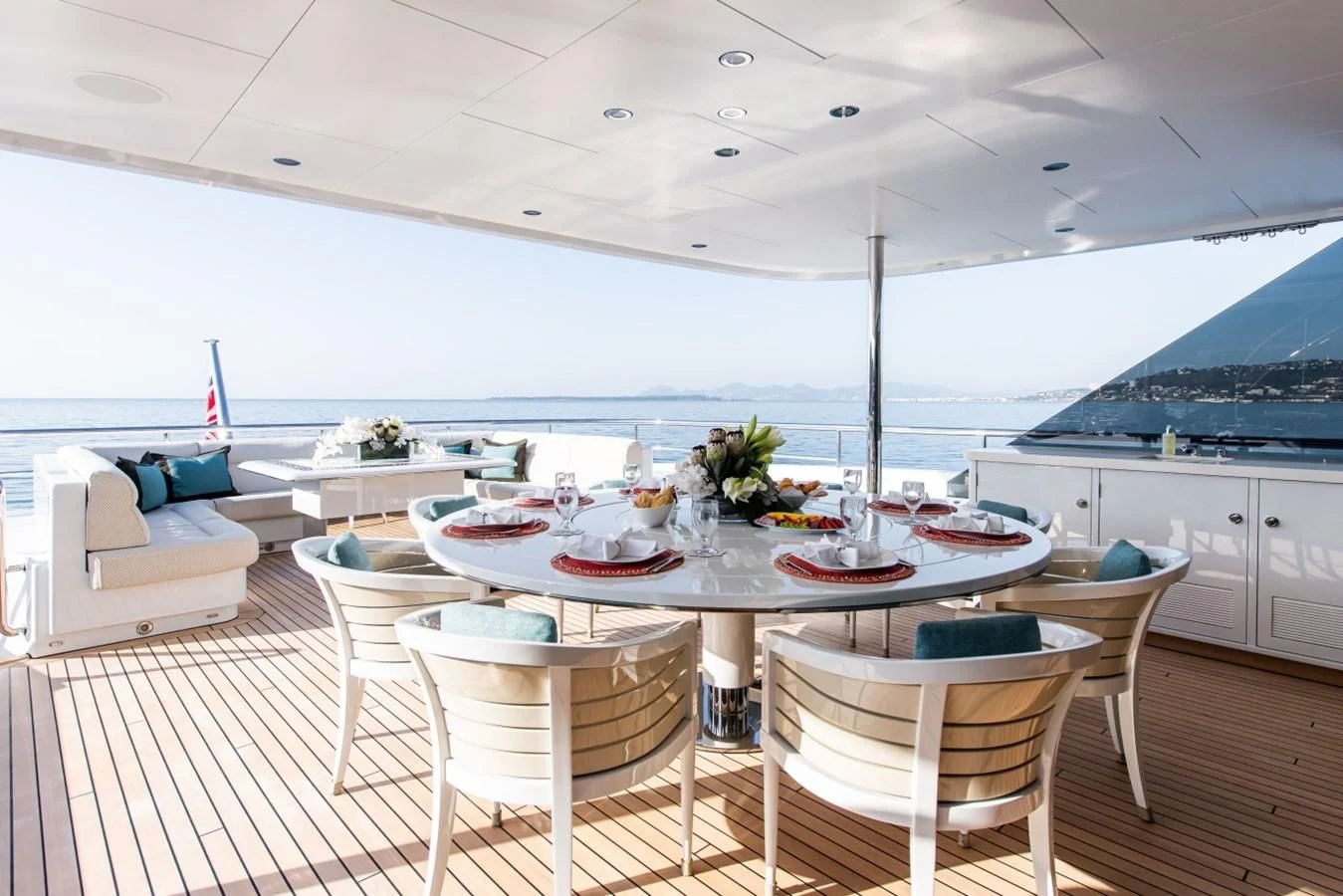 a large white table with chairs around it aboard PHILOSOPHY Yacht for Sale