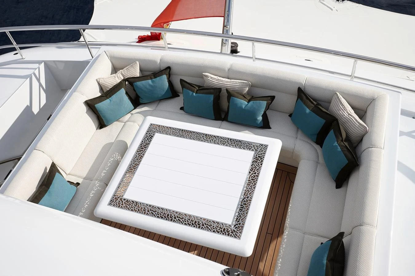 a white table with blue chairs aboard PHILOSOPHY Yacht for Sale