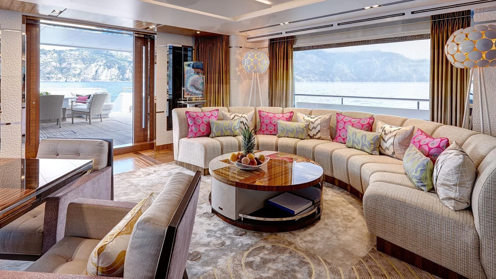 a living room with a couch and a table aboard PHILOSOPHY Yacht for Sale